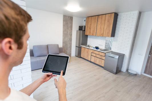 Smart apartments hero image with renter using smartphone to control devices
