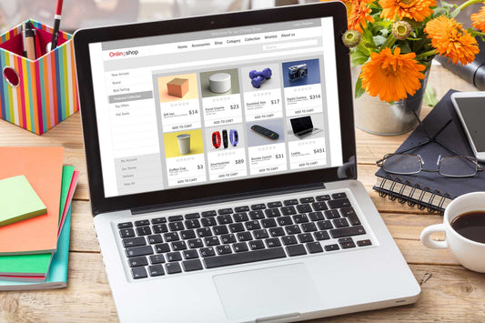 Smart home gadgets website hero image with laptop and smart devices